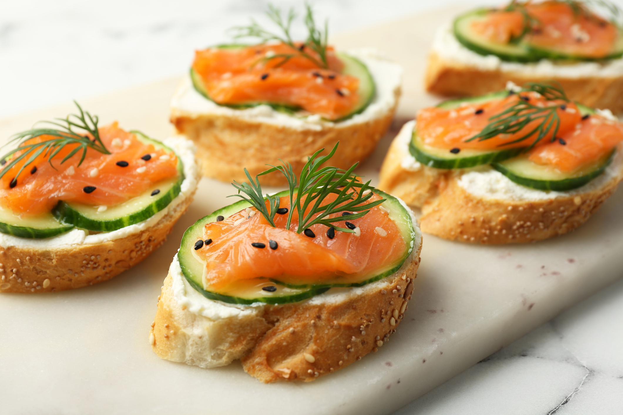 Salmon canapes with cucumber and dill